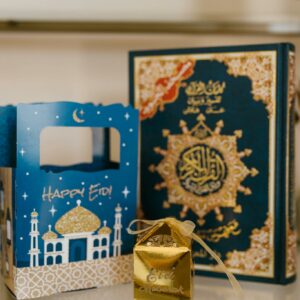 Gift Boxes And Holy Book On Table
